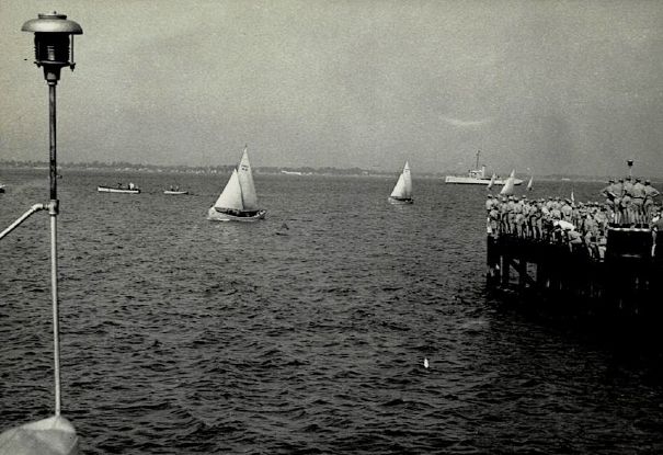 Sailors Watching Sail Boats